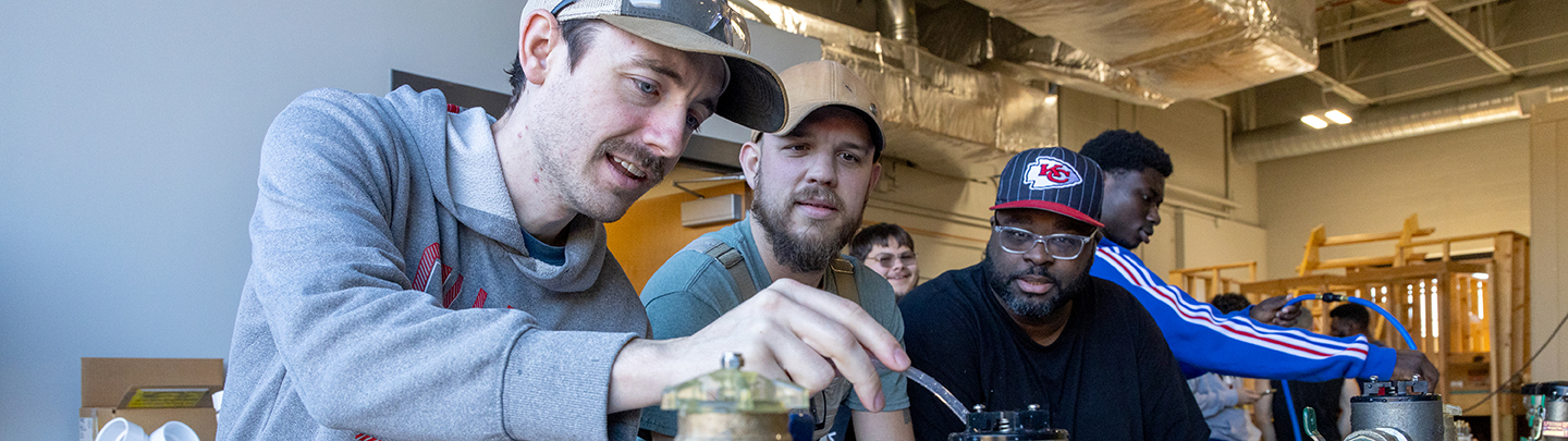 students working in a shop