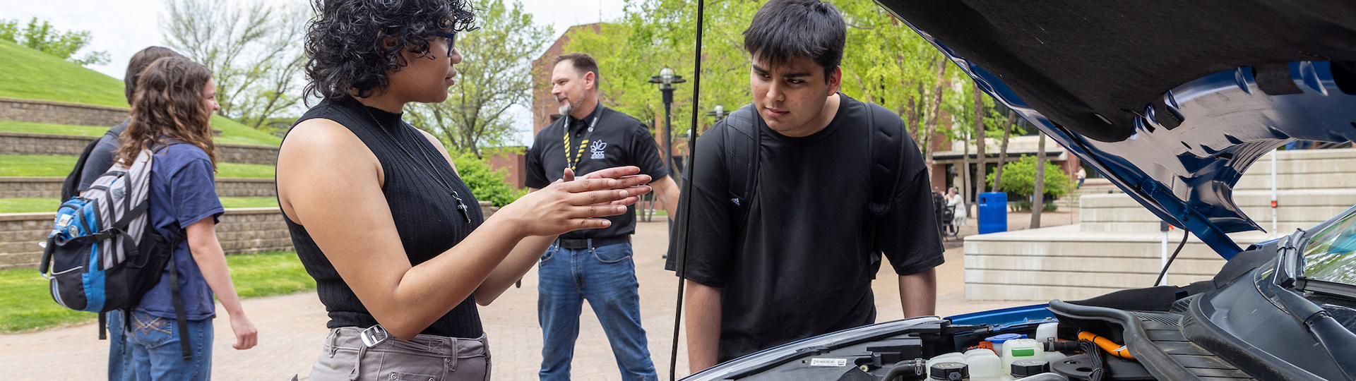 happy students walking to class
