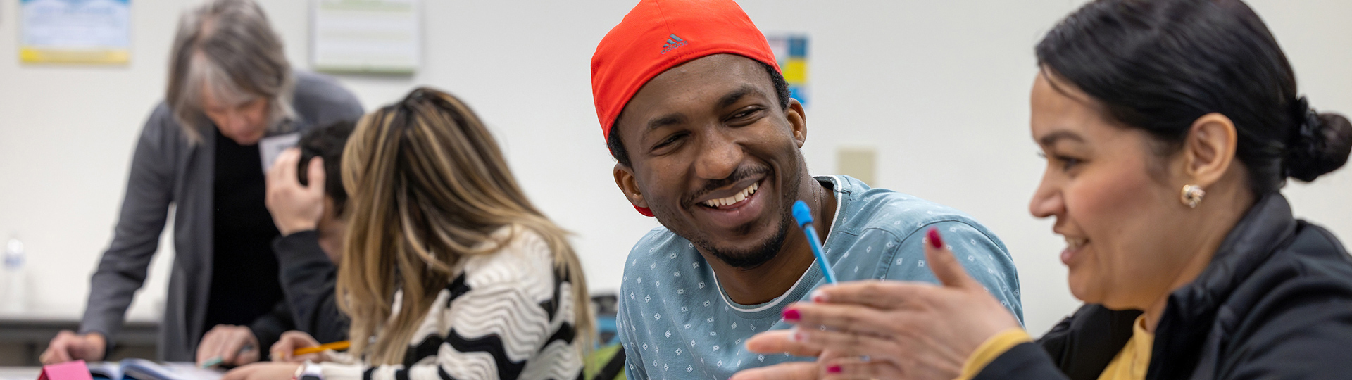 a student relaxing outside on campus